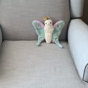 Reference Moth, the size-guide mascot who appears in the reviews